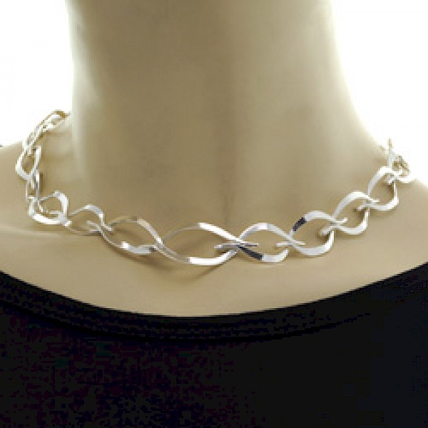 Eye Shapes Silver Necklace